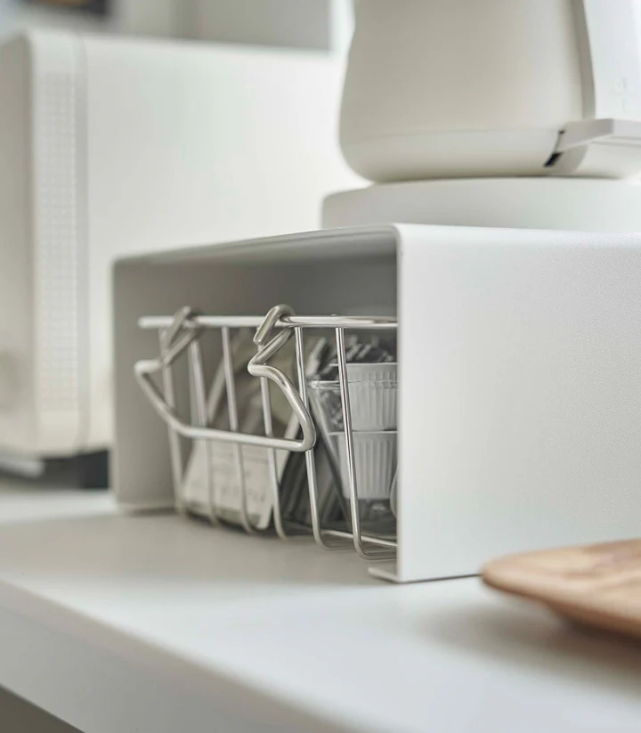 Stackable steel shelf creating vertical storage